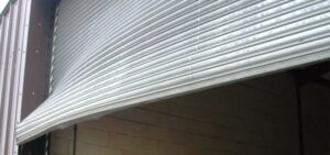Damaged shutter w850 h400 London & Kent